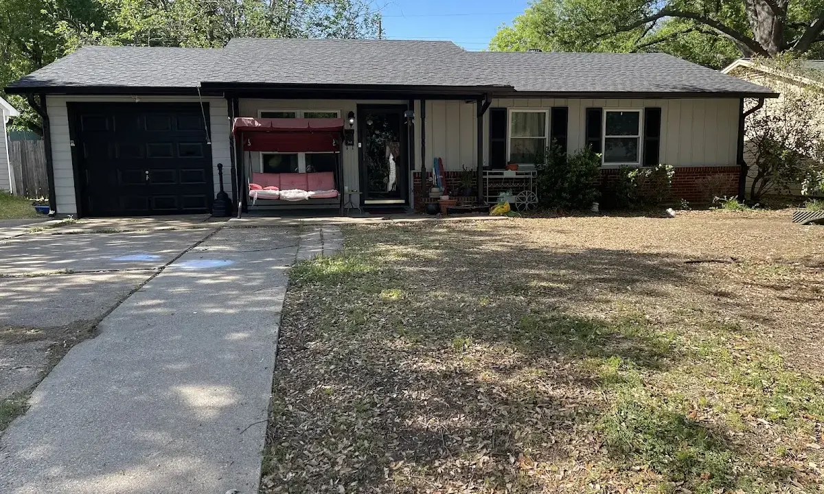Hail Damage Roof Repair crew at work on a residential roof in Reidsville